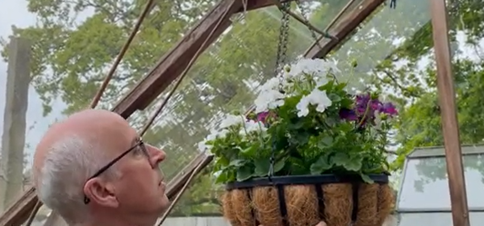 Adam Pasco and a hanging basket.